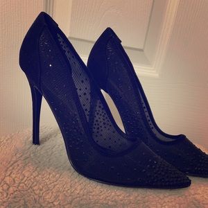 Black embellished pumps